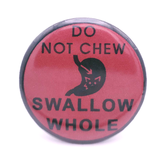Round red pin with black text, "Do Not Chew, Swallow Whole" and a black silhouette of a cat inside a stomach on a white background.